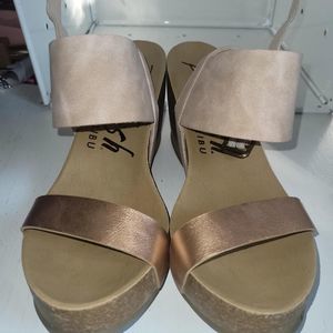 blowfish a womans size 9.5 wedges Very cute. Run a bit small more like a 9